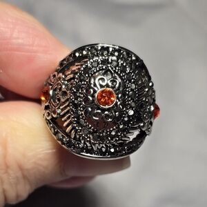 Ornate Silver Ring with Orange Gemstones